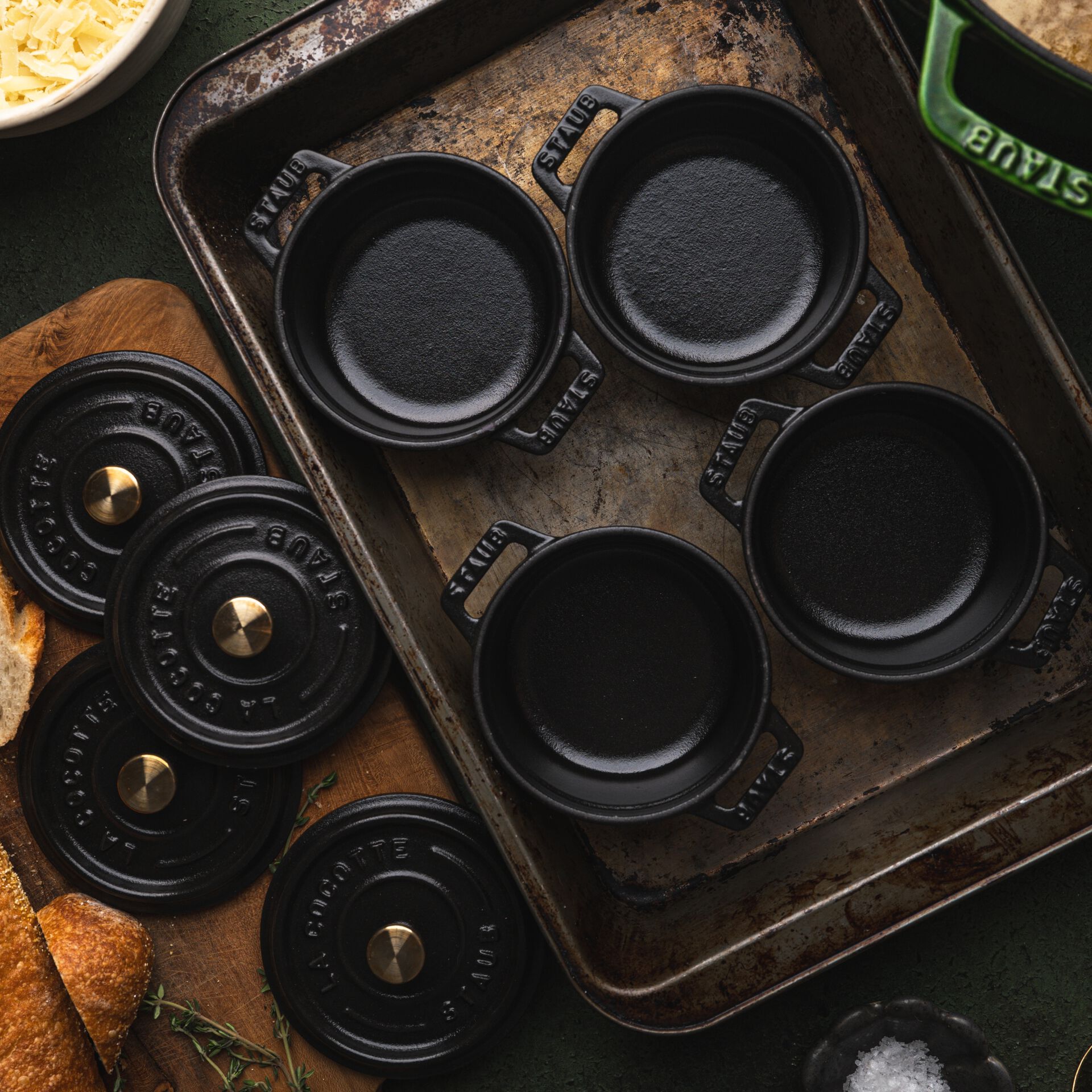 Staub black 0.25 cocottes on sheetpan