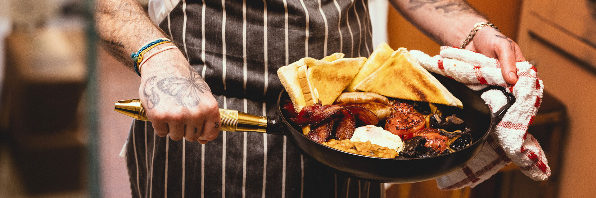 Buster & Punch Staub frying pan with full English breakfast.