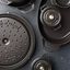 Underside of Staub matte black dutch oven lids with textured interior. preview
