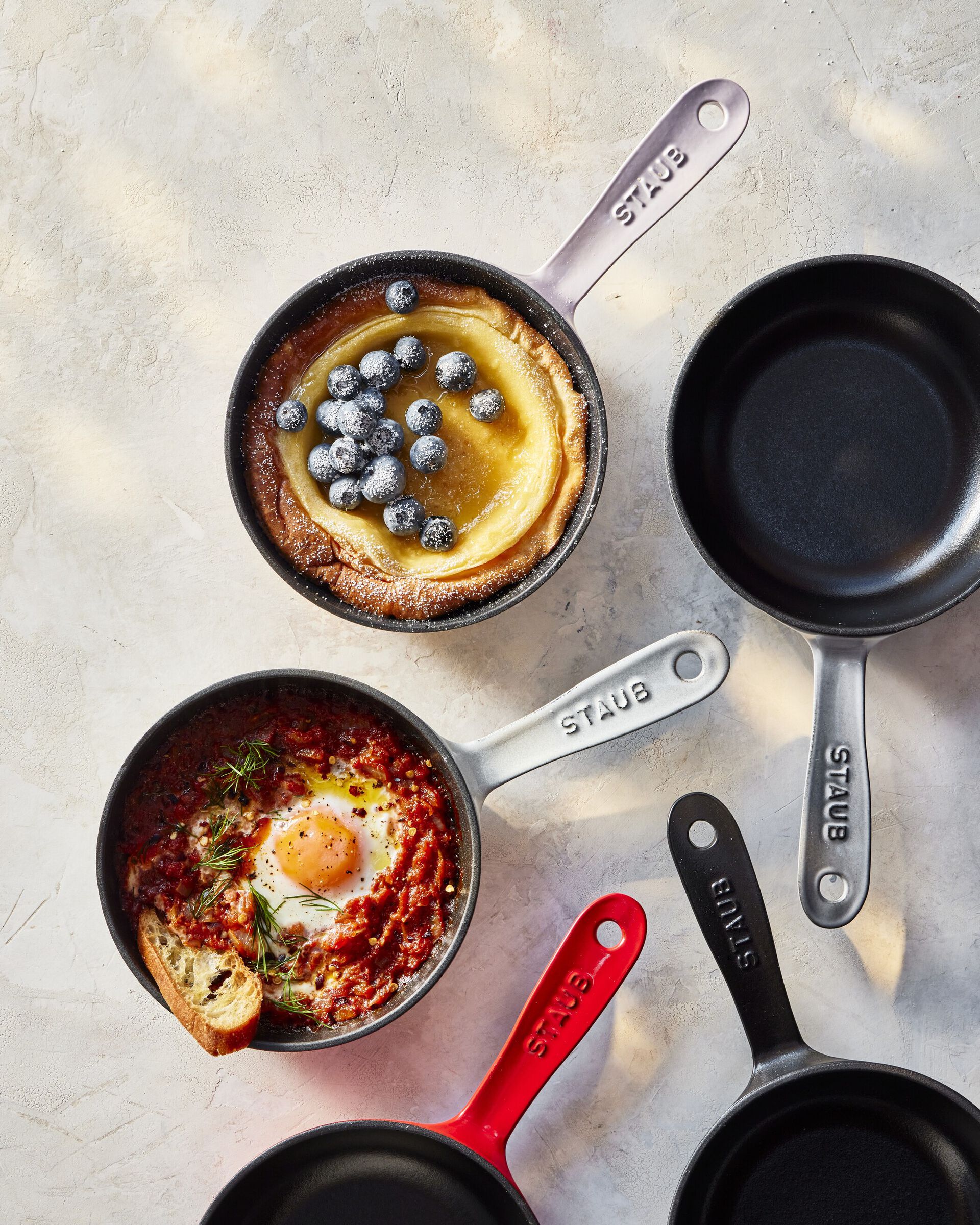 Collection photo of mini cast iron frying pans.